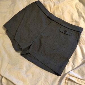 Gray with black dots shorts.